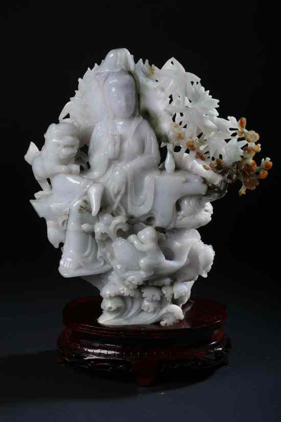 Appraisal: CHINESE GREYISH LAVENDER AND RUSSET JADEITE FIGURAL GROUP OF GUANYIN