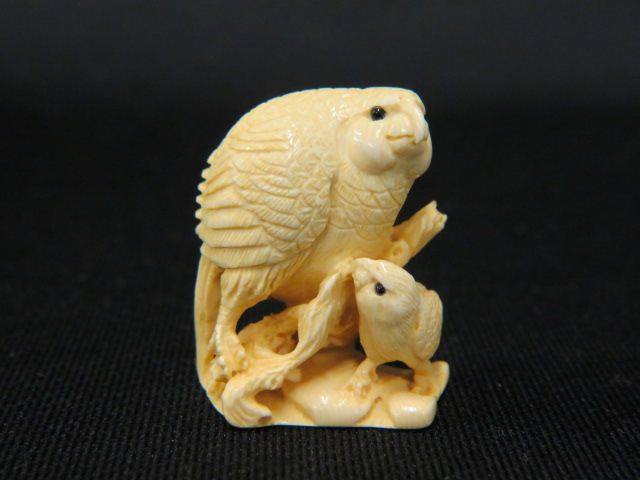 Appraisal: Carved Ivory Netsuke of Birdand baby bird signed excellent