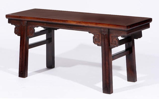 Appraisal: A Chinese rosewood low tablecirca on carved supports cm long