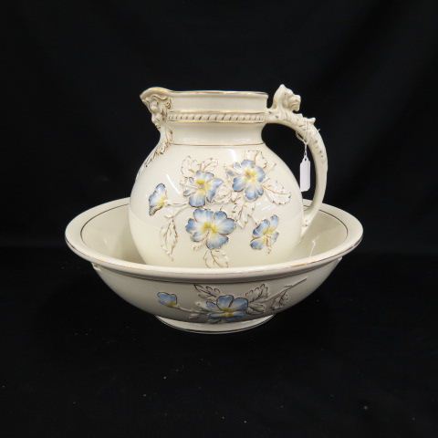 Appraisal: Victorian Ironstone Pitcher Bowl Set raised flowers gold trim figural