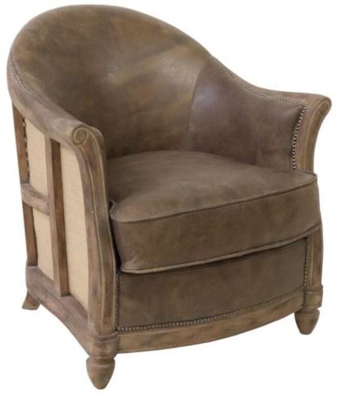 Appraisal: Leather club chair th c having rounded back with nailhead