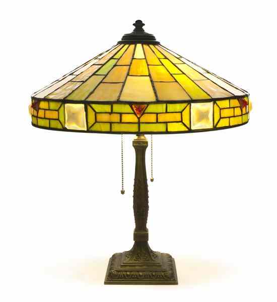 Appraisal: An American Leaded Glass Lamp Wilkinson having a conical geometric