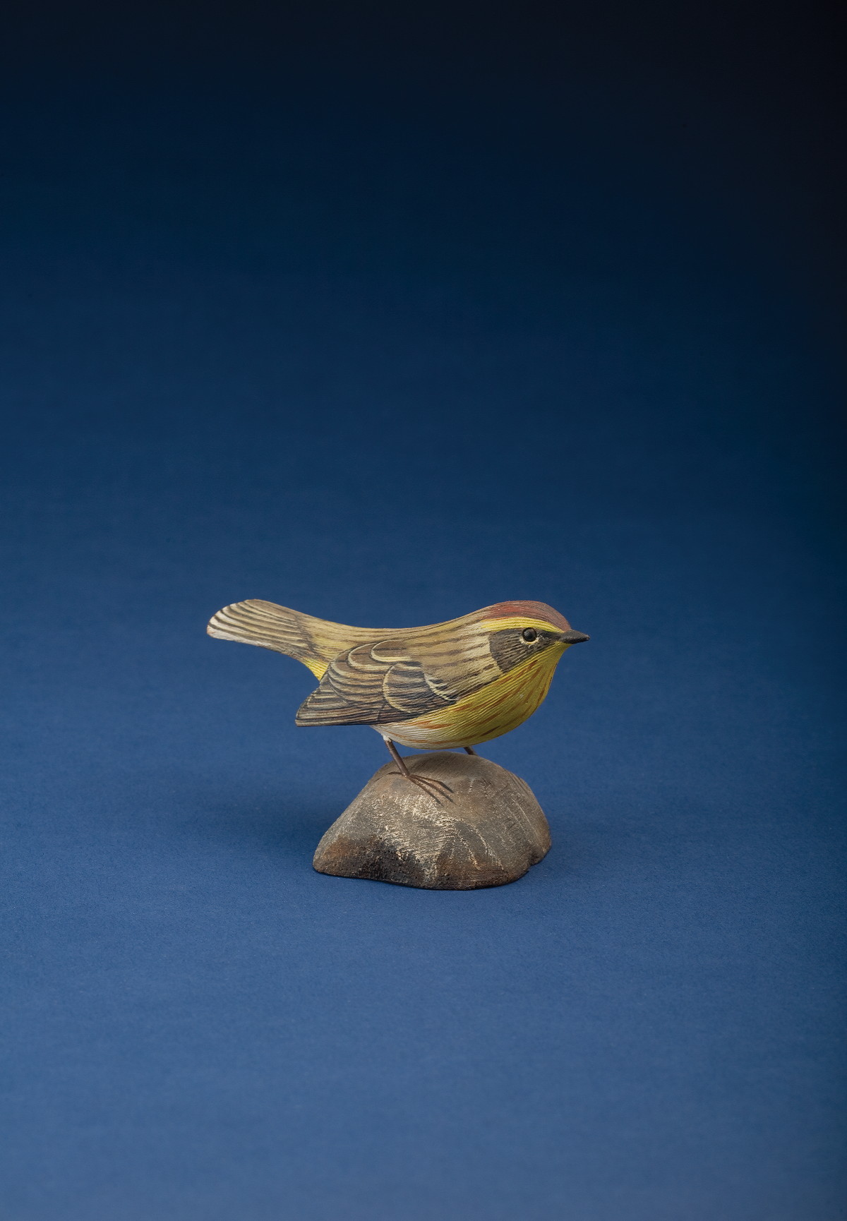 Appraisal: JESS BLACKSTONE AMERICAN - CARVED AND PAINTED PALM WARBLER CIRCA