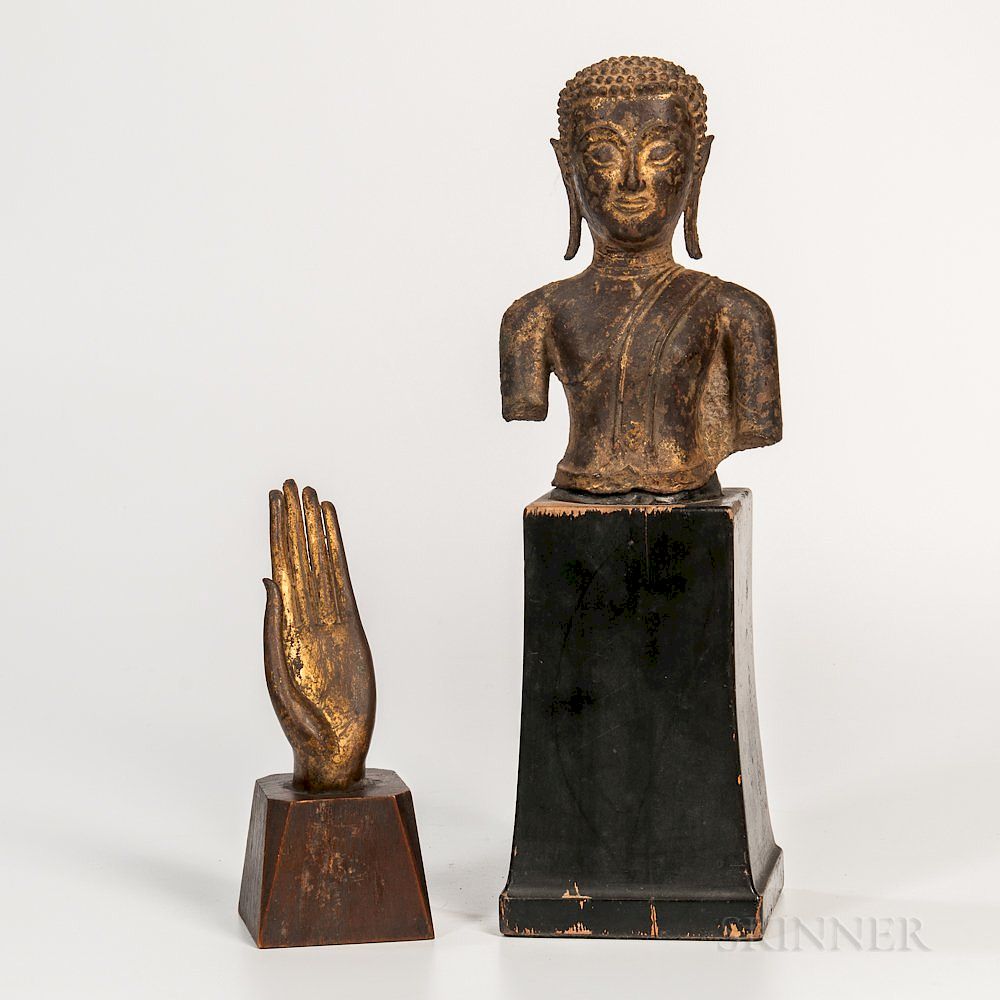 Appraisal: Gold-lacquered Bronze Head Torso and a Hand of Buddha Gold-lacquered