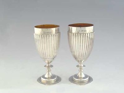 Appraisal: A pair of Victorian pedestal goblets with fluted bodies and