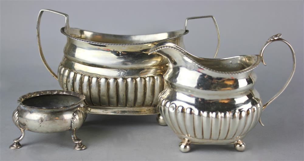 Appraisal: THREE GEORGE III SILVER WARES including a footed salt London