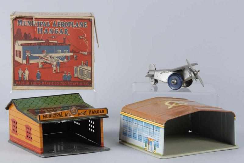 Appraisal: Lot of Tin Marx Airport Hangar Toys Description American Includes