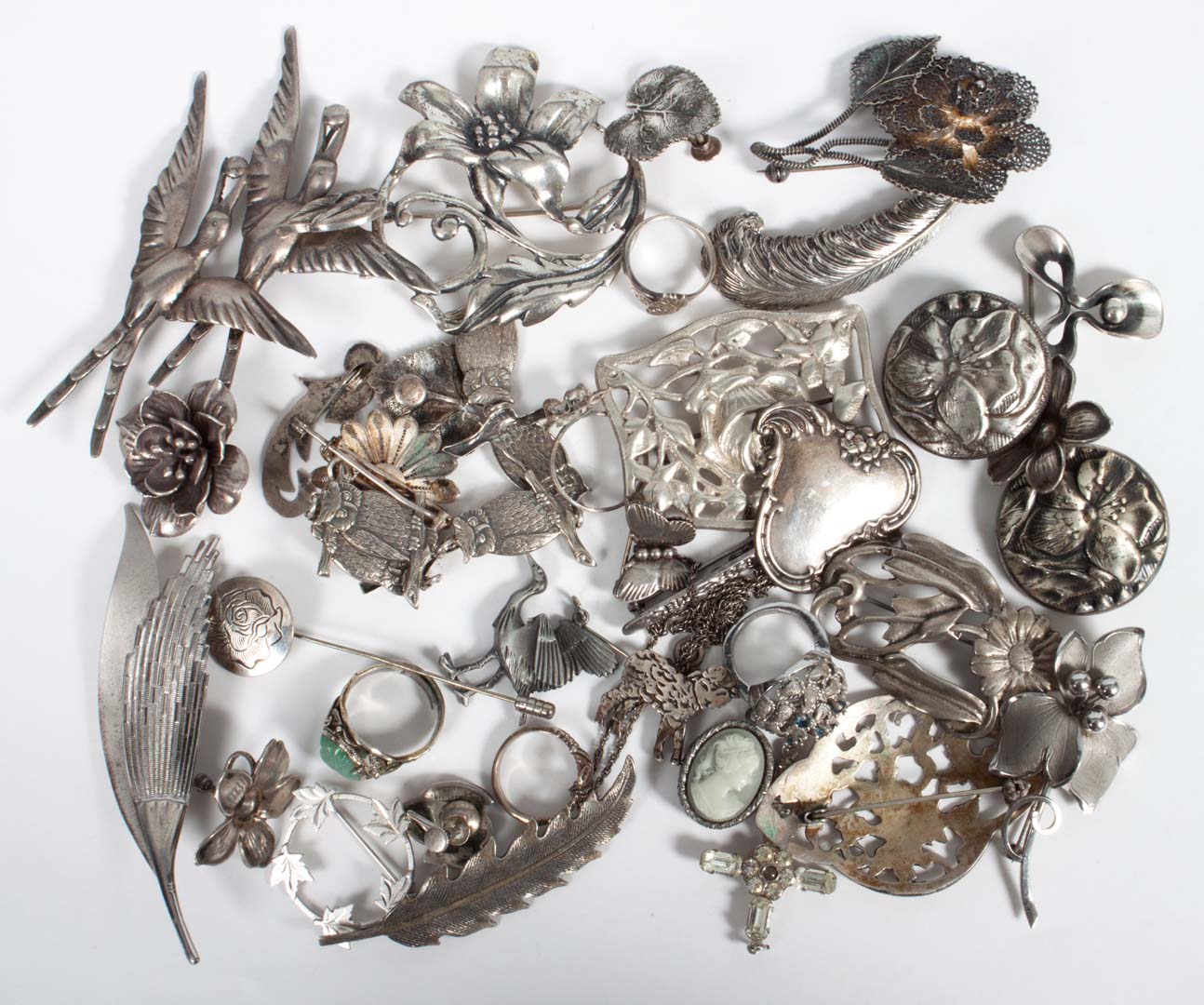 Appraisal: Group of assorted silver jewelry items comprising pieces including brooches