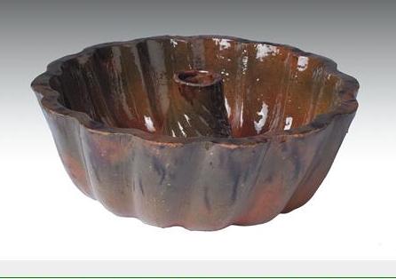 Appraisal: FIVE NEW ENGLAND OR NEW YORK GLAZED REDWARE CAKE MOLDS