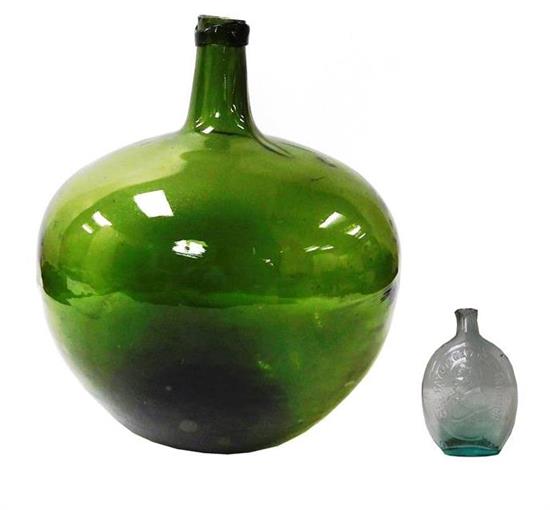 Appraisal: GLASS demijohn bottle and historical flask two pieces the first