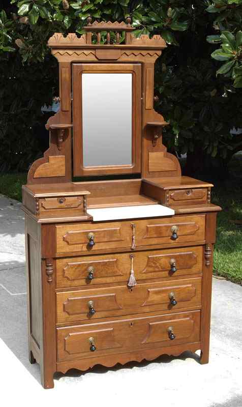 Appraisal: RENAISSANCE REVIVAL VICTORIAN DRESSER WITH MIRROR Traditional Victorian style with