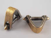 Appraisal: A pair of French silver and gold stirrup cufflinks marked