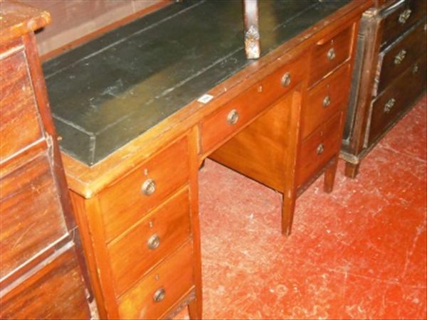 Appraisal: A mahogany twin pedestal desk