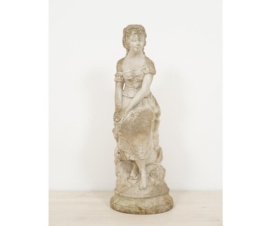 Appraisal: Cast stone garden statue of a seated woman h x