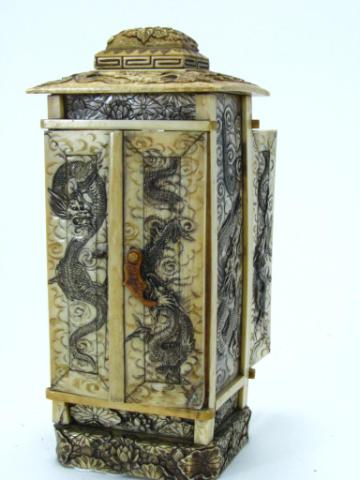 Appraisal: Engraved Ivory Oriental two sided Cask with two sided icon