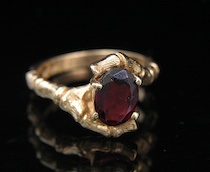 Appraisal: An Unusual Ladies' Garnet Gold Ring A k yellow gold