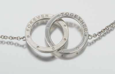 Appraisal: A Sterling Silver and Diamond Forever Together Necklace Sterling silver