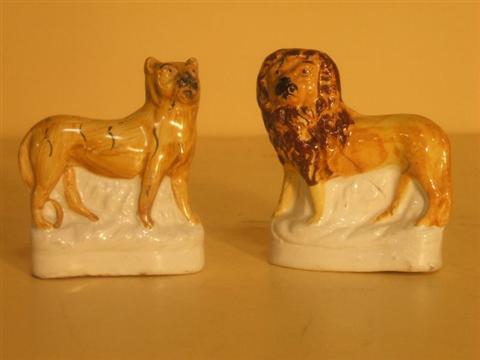 Appraisal: A STAFFORDSHIRE LION AND A TIGER Late th century each