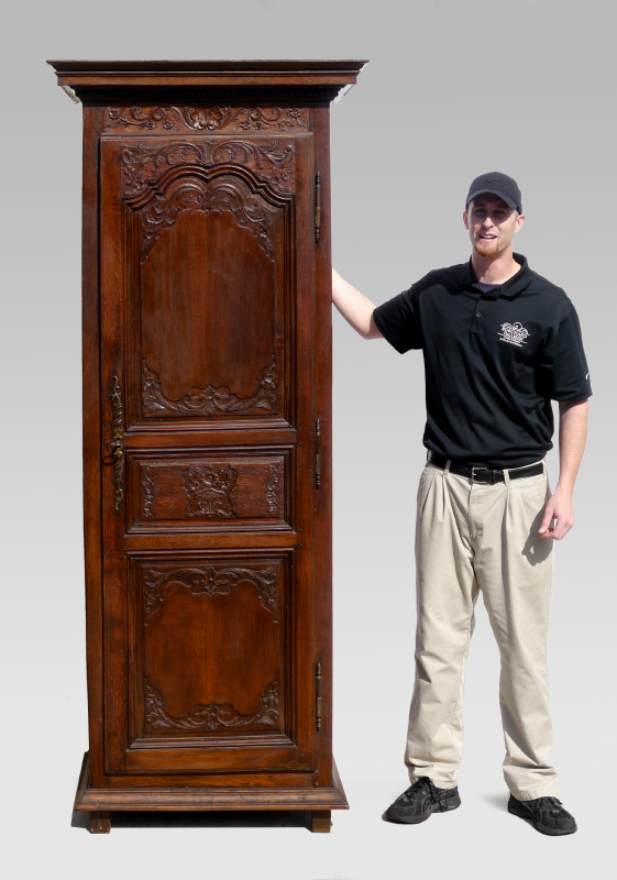 Appraisal: TALL CARVED BLIND CUPBOARD Stepped pediment with dentil molding carved