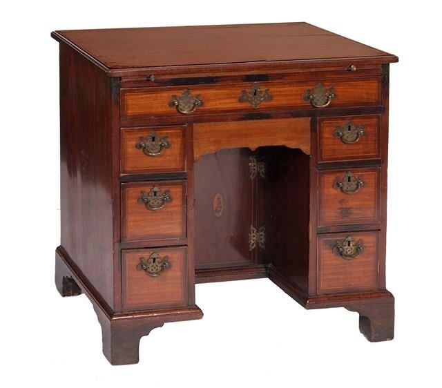 Appraisal: A GEORGE III MAHOGANY RECTANGULAR KNEEHOLE WRITING DESK with boxwood