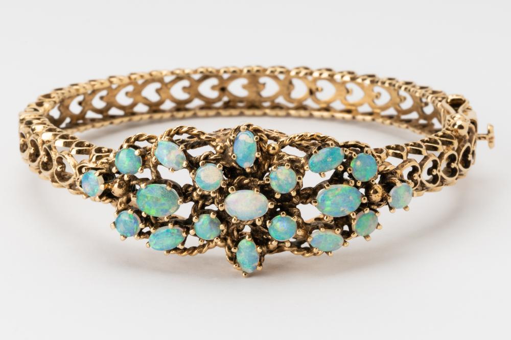 Appraisal: KARAT YELLOW GOLD OPAL BANGLE BRACELETset with oval or round