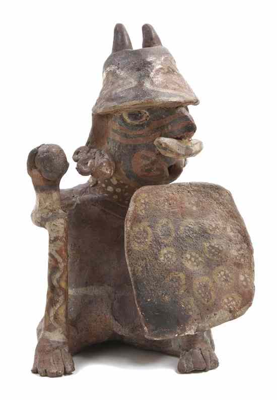 Appraisal: A Nayarit Terracotta Figure depicting a seated male warrior with