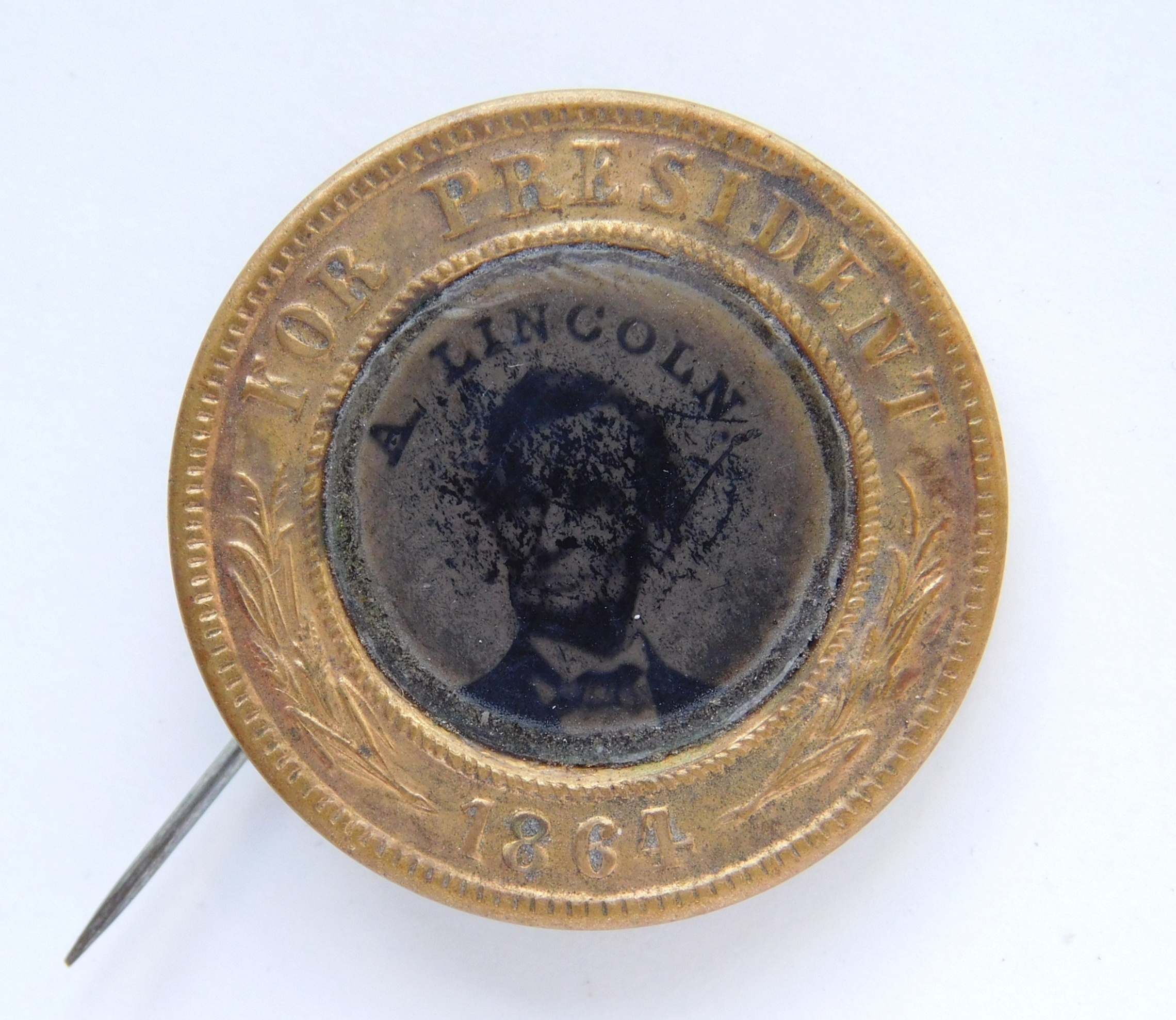 Appraisal: Lincoln ferrotype campaign pin round ferrotype of President Lincoln marked