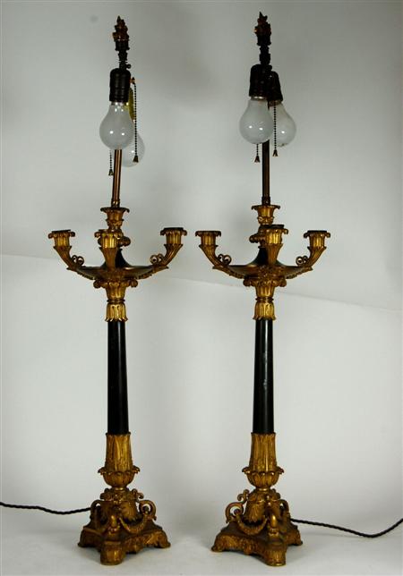 Appraisal: PAIR OF FRENCH GILT AND PATINATED BRONZE CANDELABRA EMPIRE STYLE