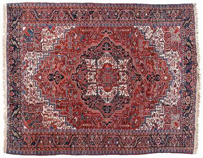 Appraisal: Heriz rug typical designs on brick red field mid to