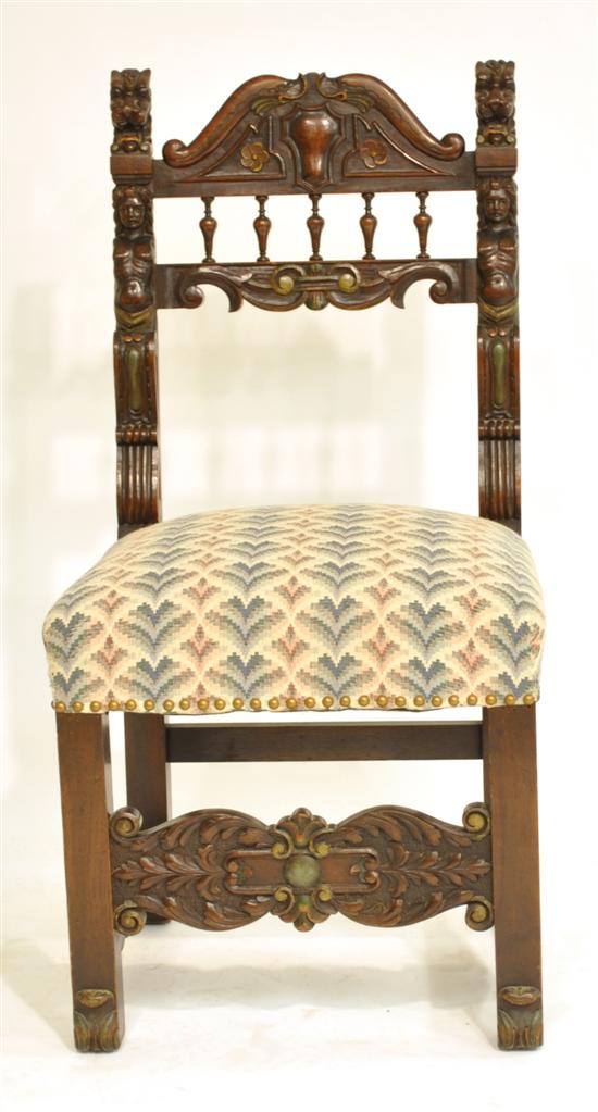 Appraisal: Carved side chair carved dolphin crest figural back with spindles