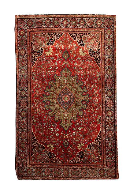 Appraisal: A PERSIAN SAROUK RED GROUND RUG with a multiple banded