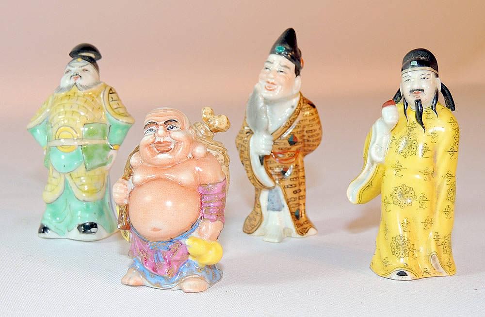 Appraisal: Four Porcelain Figural Snuff Bottles Four porcelain figural snuff bottles