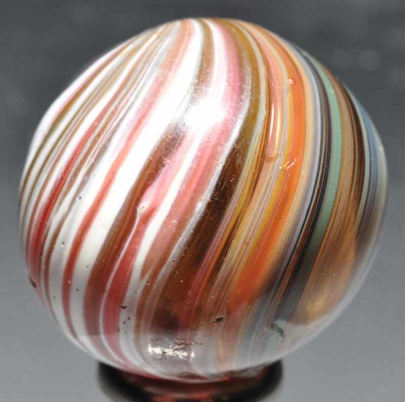 Appraisal: Light Brown Glass Marble Description Light amber translucent base with