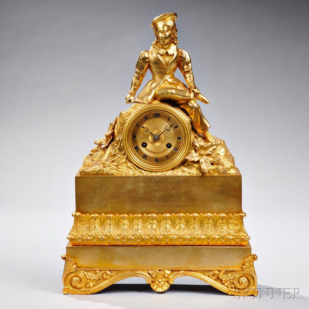 Appraisal: Gilt French Figural Clock France c a young man in