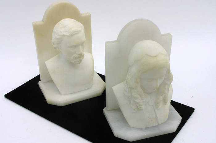 Appraisal: PAIR MARBLE SCULPTED BOOKENDS one depicts bust of a young