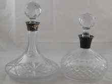 Appraisal: A silver mounted cut glass ship's decanter Birmingham another squat