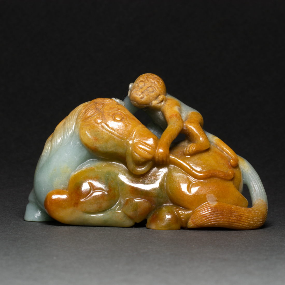 Appraisal: CHINESE RUSSET JADEITE CARVING Chinese russet jadeite carving carved in