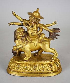 Appraisal: SINO-TIBETAN GILT BRONZE th th Century Depicting a multi-armed deity