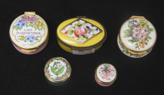 Appraisal: Four English enameled boxes all with floral motif along with