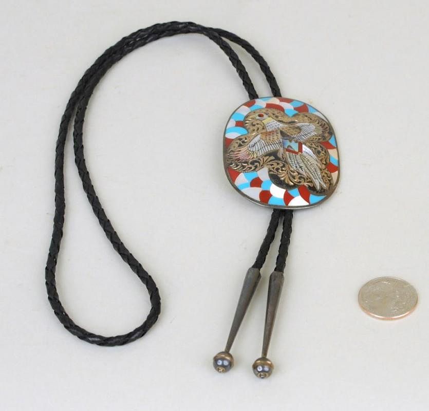 Appraisal: Zuni Multistone Inlaid Silver Bolo Tie Pendant Zuni multi-stone inlaid