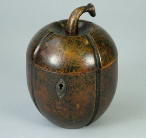 Appraisal: A Georgian fruit wood tea caddy in the form of