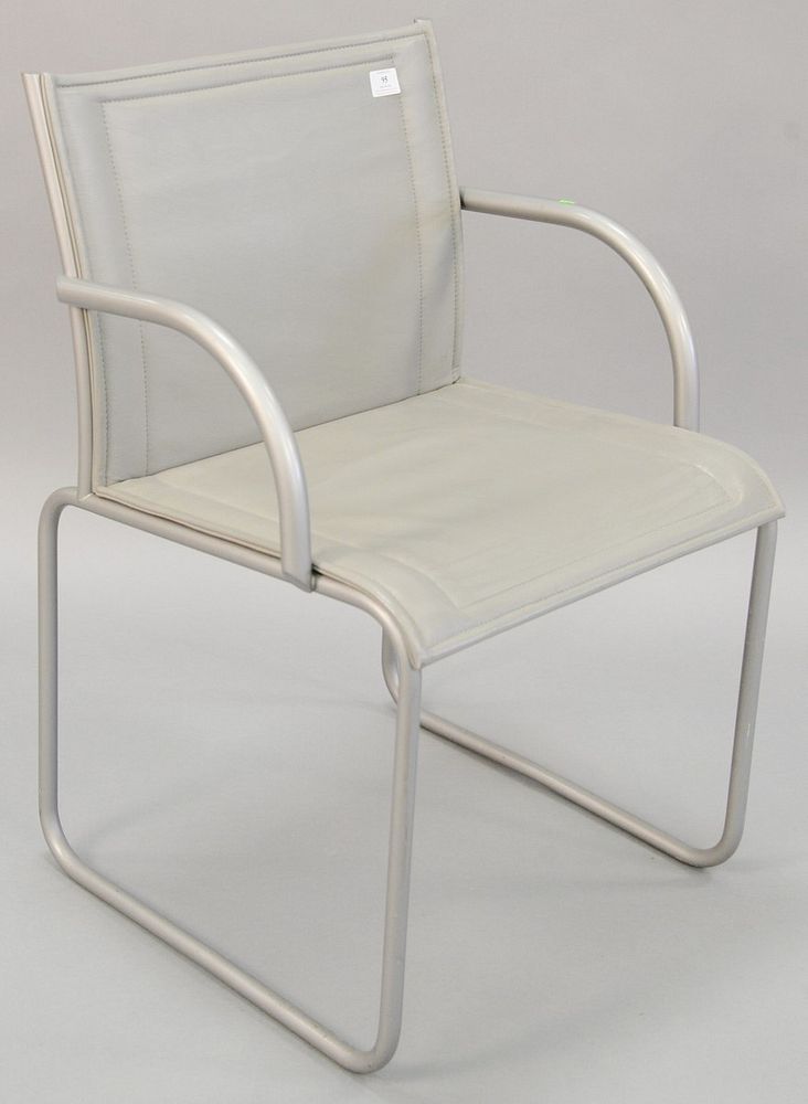 Appraisal: Knoll International gray leather armchair with metal arms and legs