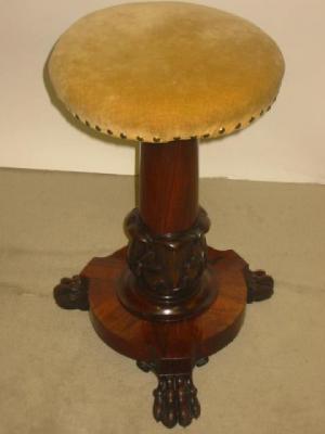 Appraisal: A ROSEWOOD PIANO STOOL the circular adjustable seat in yellow