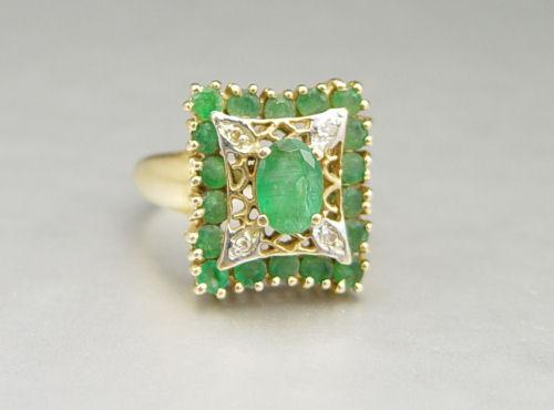 Appraisal: K DIAMOND EMERALD RING K yellow gold ring contains four