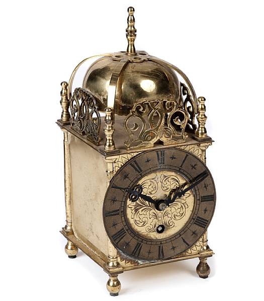 Appraisal: An English gilt brass lantern clock height in width in