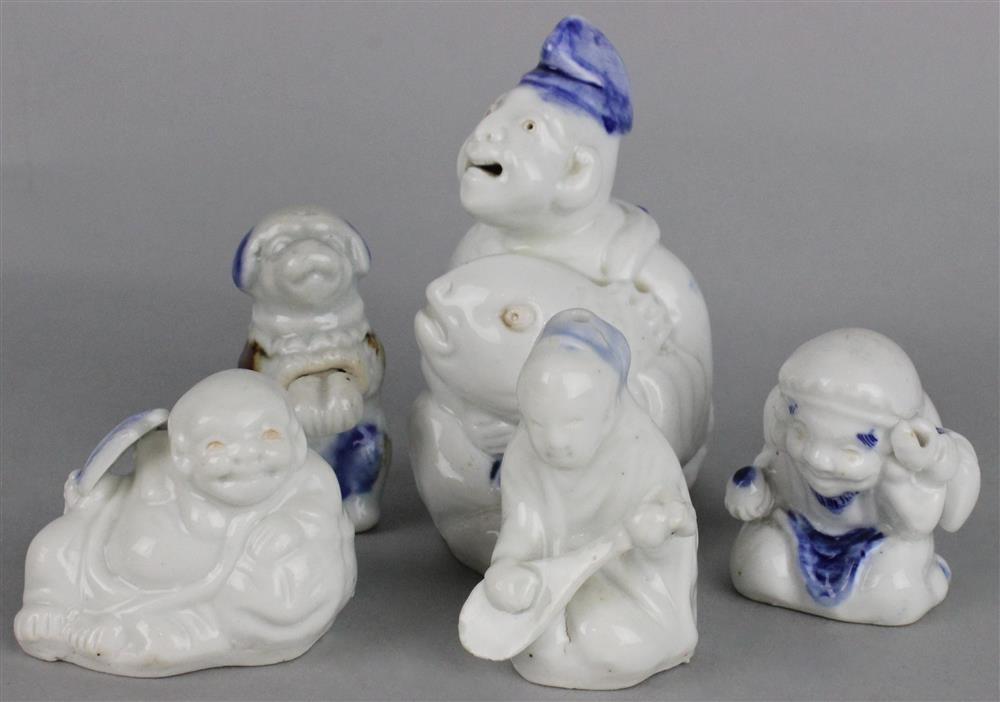 Appraisal: FIVE JAPANESE HIRADO FIGURES the first molded as Ebisu and