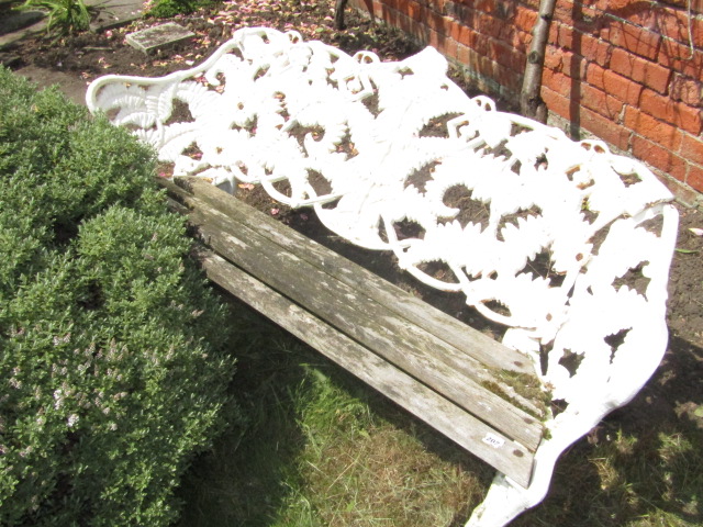 Appraisal: A cast iron garden bench in the Coalbrookdale fern pattern