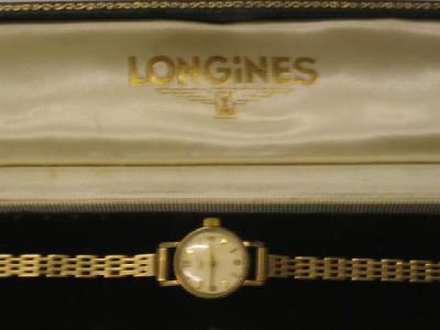 Appraisal: A LADY'S LONGINES CT GOLD WATCH the winding movement having