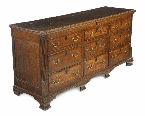 Appraisal: A George III oak low dresser Lancashire Cheshire pattern the