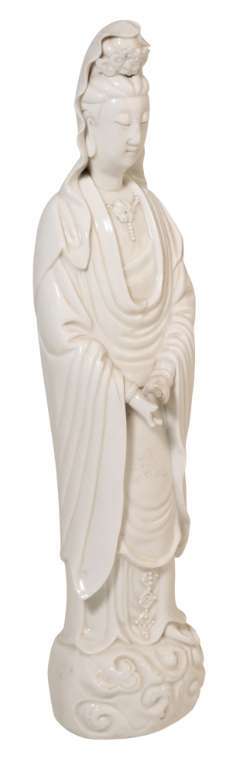 Appraisal: A DEHUA BLANC DE CHINE FIGURE OF GUANYIN with associated